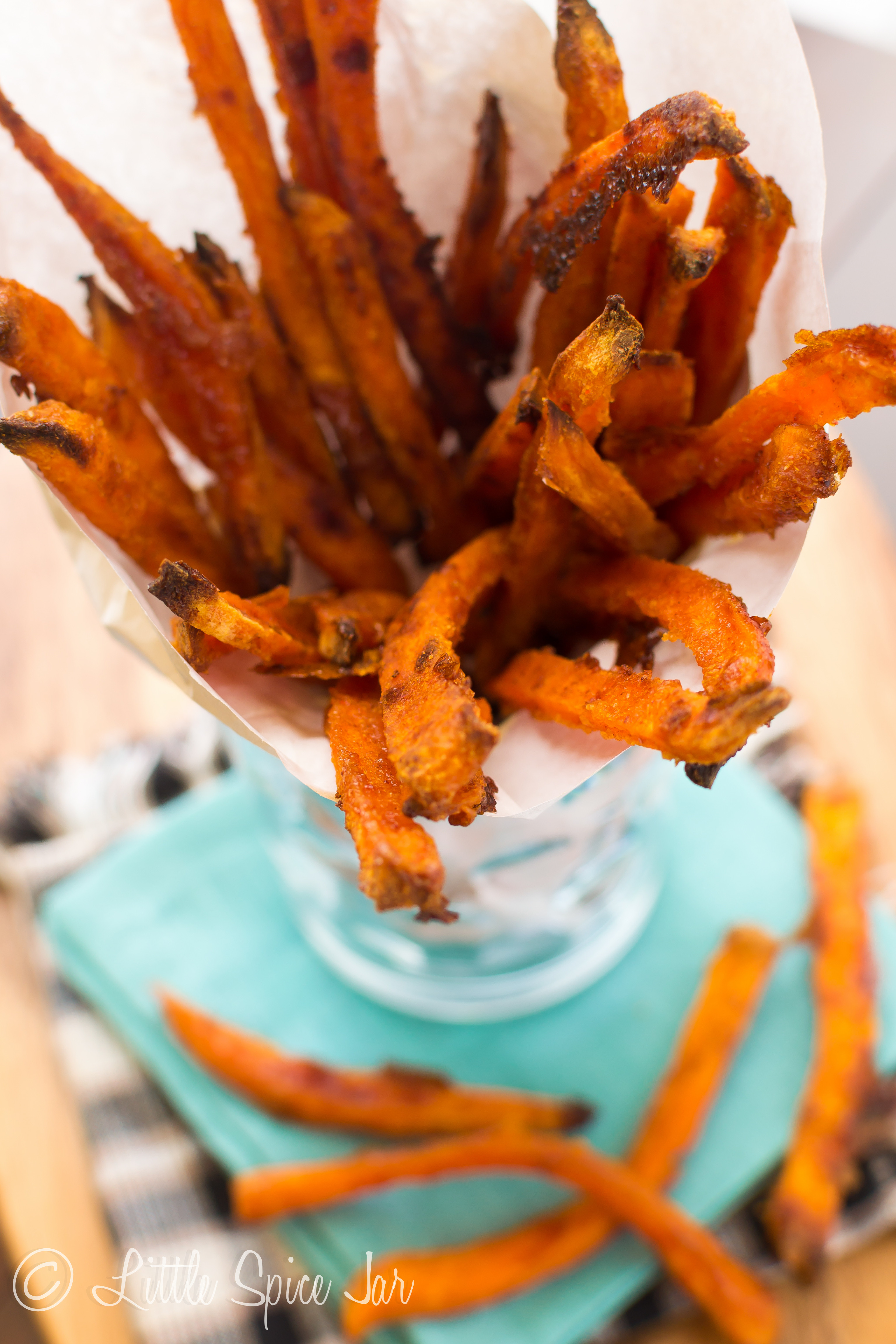 Baked Sweet Potato Chips
 SWEET & SPICY BAKED SWEET POTATO FRIES