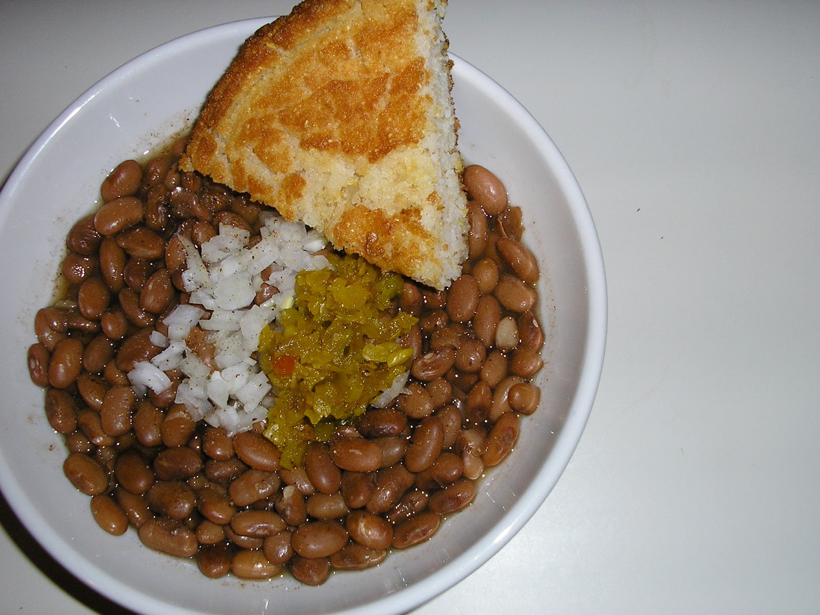 Beans And Cornbread
 Fatback and Foie Gras Brown Beans Cornbread and