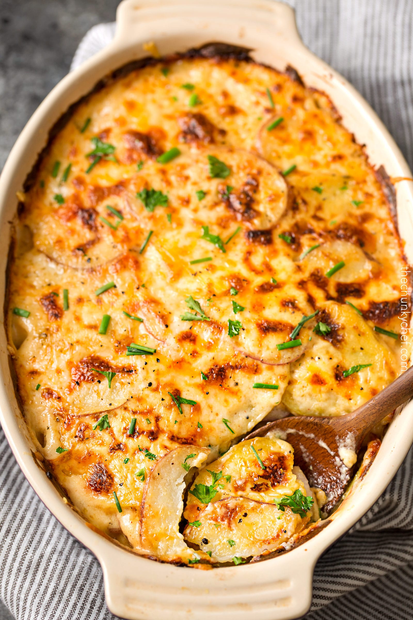 Cheesy Scalloped Potatoes Recipe
 Garlic Parmesan Cheesy Scalloped Potatoes The Chunky Chef