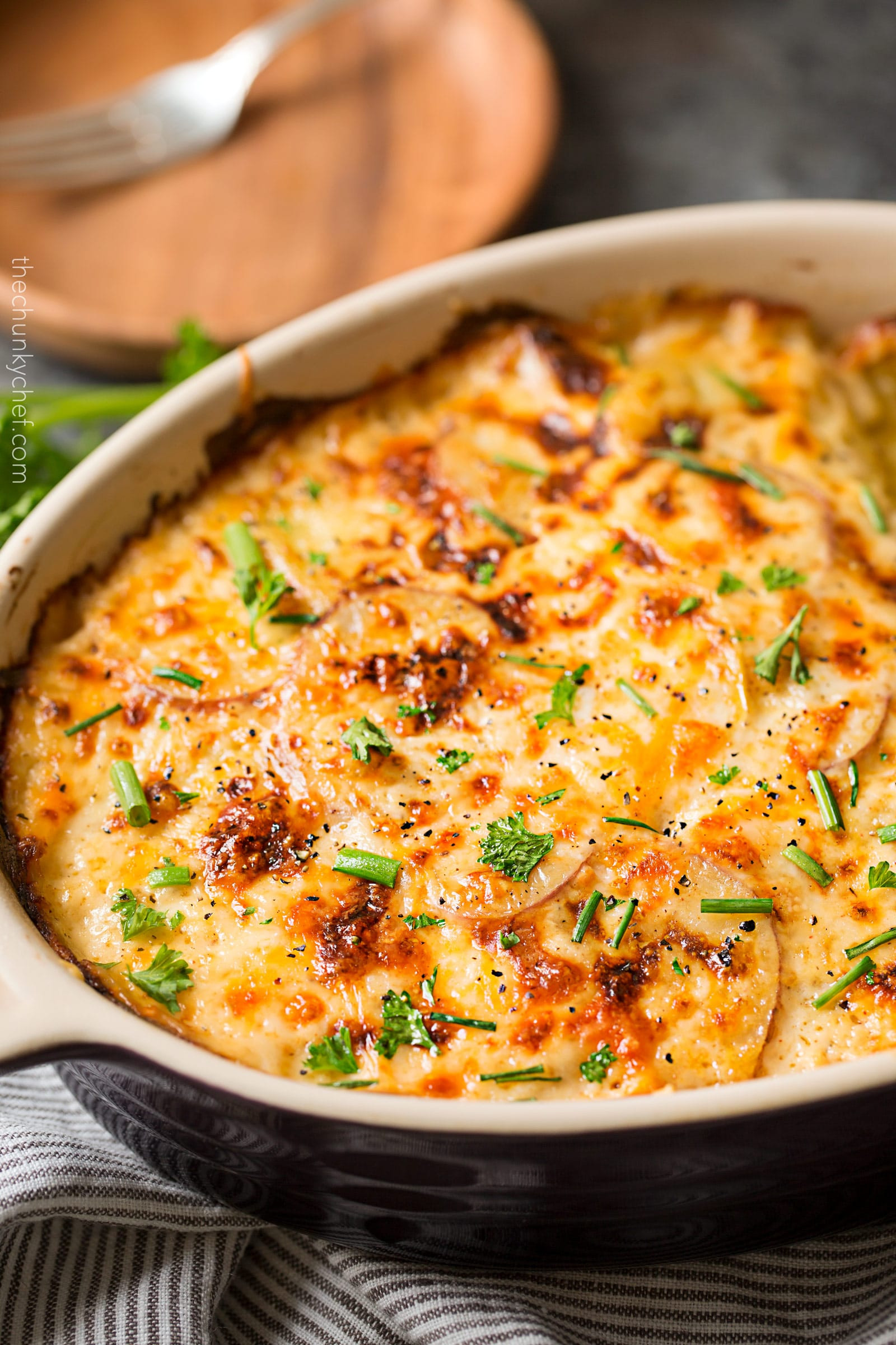 Cheesy Scalloped Potatoes Recipe
 Garlic Parmesan Cheesy Scalloped Potatoes The Chunky Chef