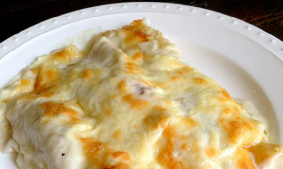 Chicken Enchiladas With White Sauce
 Chicken Enchiladas with Sour Cream White Sauce