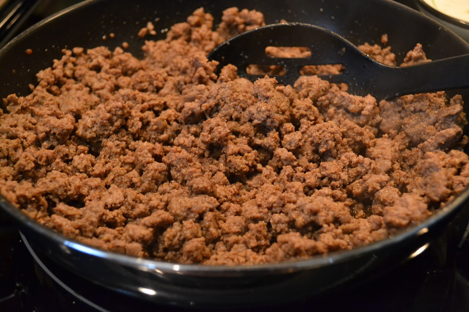 Cook Ground Beef
 Cooking Up A Storme Easy Cheesy Beef & Bean Burritos