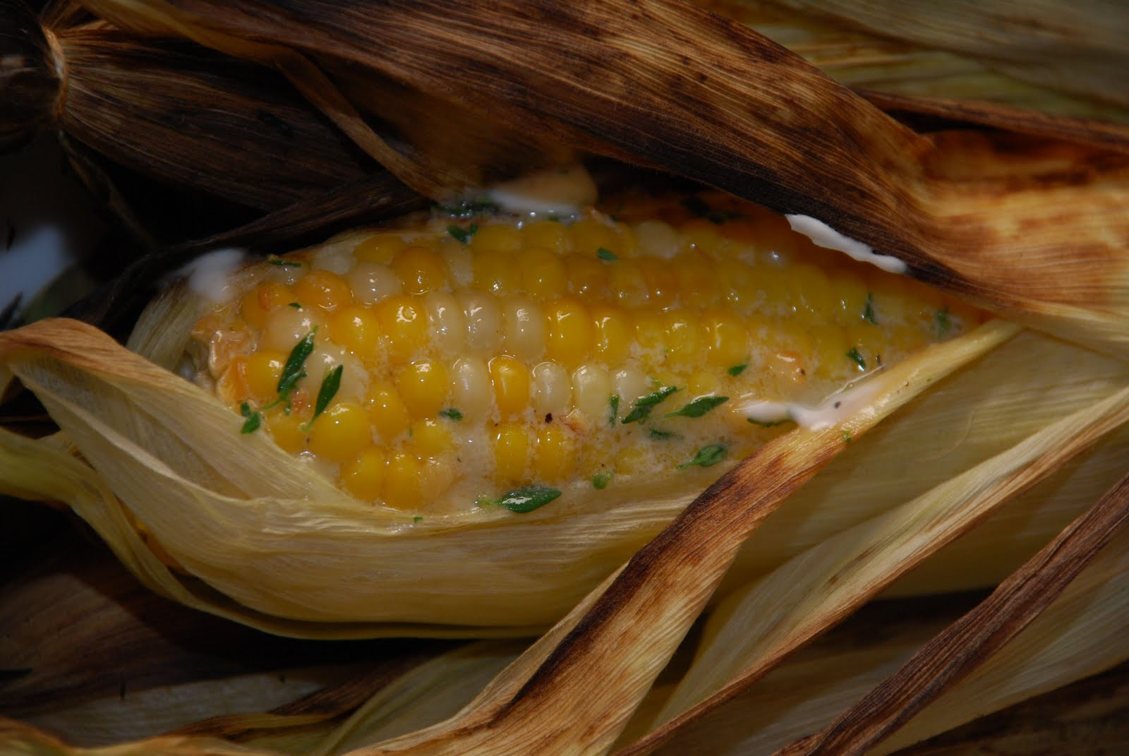 Corn On Grill
 Tomatoes on the Vine Grilled Corn with Toasted Garlic