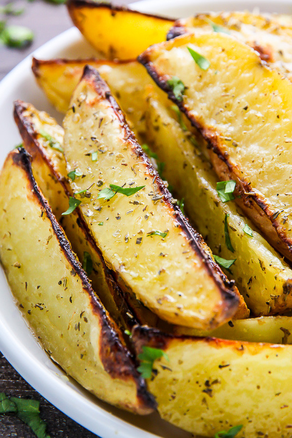 Crispy Baked Potato Wedges
 Extra Crispy Baked Garlic & Herb Potato Wedges Baker by