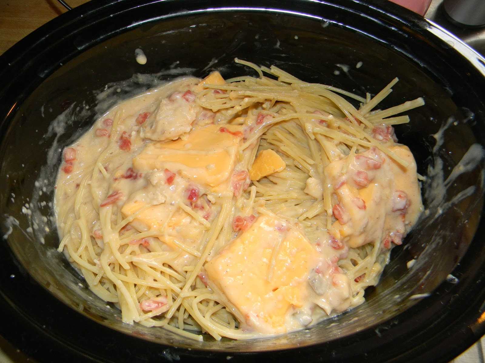 Crock Pot Chicken Spaghetti
 Growing to Four Crock pot Cheesy Chicken Spaghetti