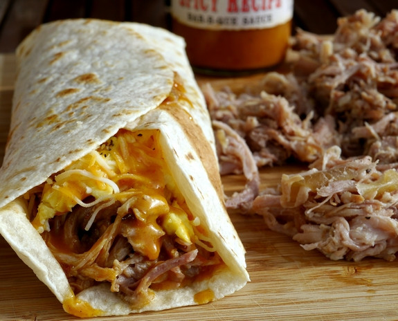 Crockpot Breakfast Burritos
 Slow Cooker Pulled Pork Breakfast Burritos drinksfeed