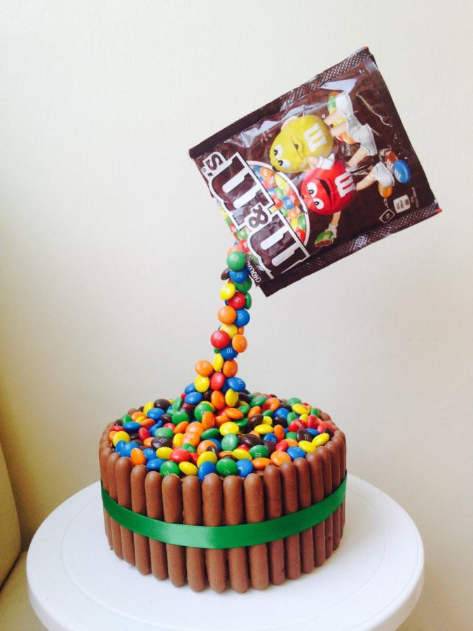 M.A.C Birthday Cake
 M&M s Gravity Cake cake by Donna Sanders CakesDecor