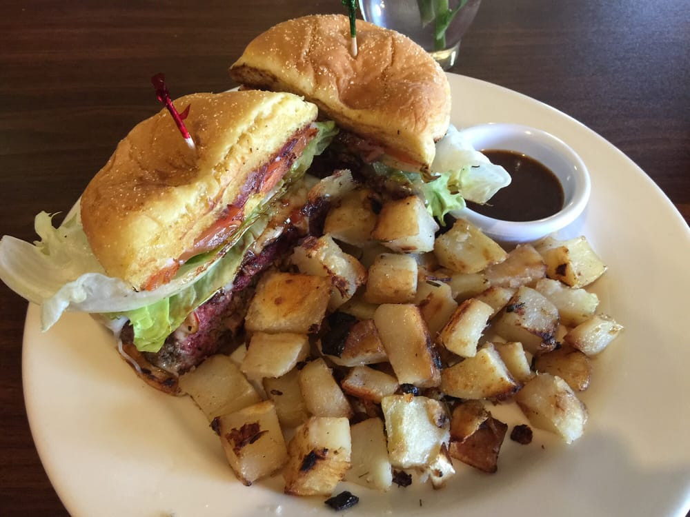 Mrs Potato Restaurant
 Stuffed Jerk Burger with Rosemary Potatoes Yelp