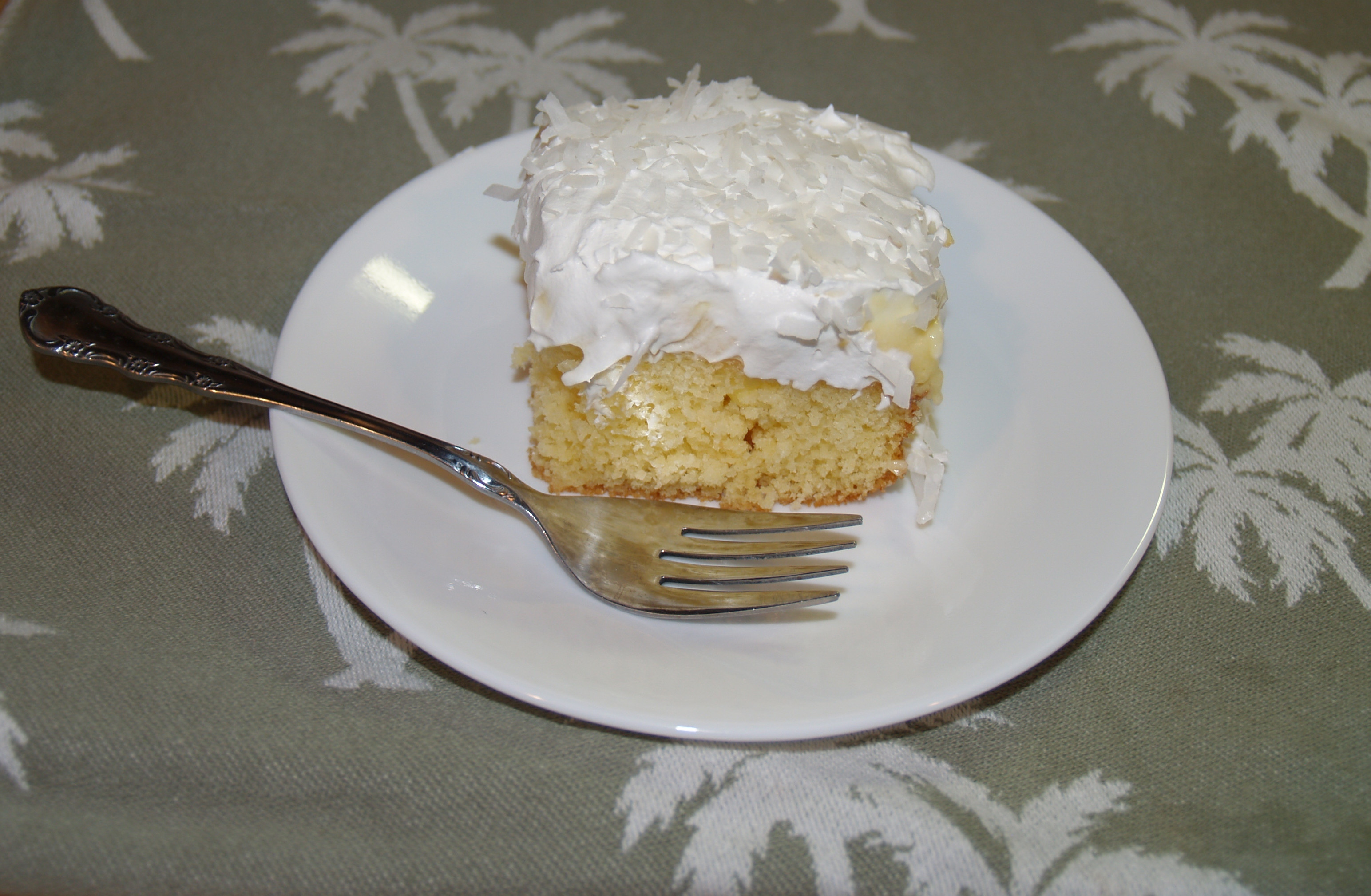 Pina Colada Poke Cake
 Pina Colada Poke Cake