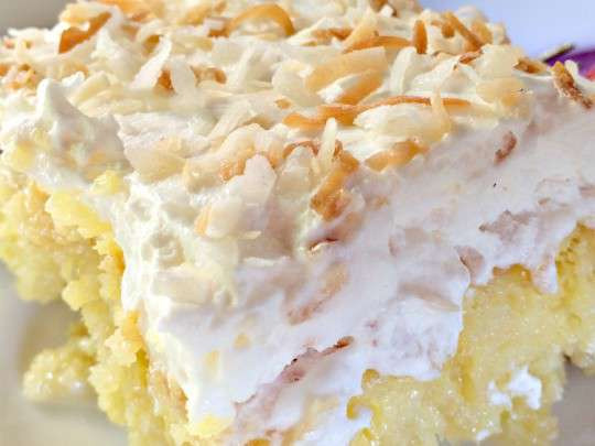 Pina Colada Poke Cake
 25 Poke Cake Recipes NoBiggie