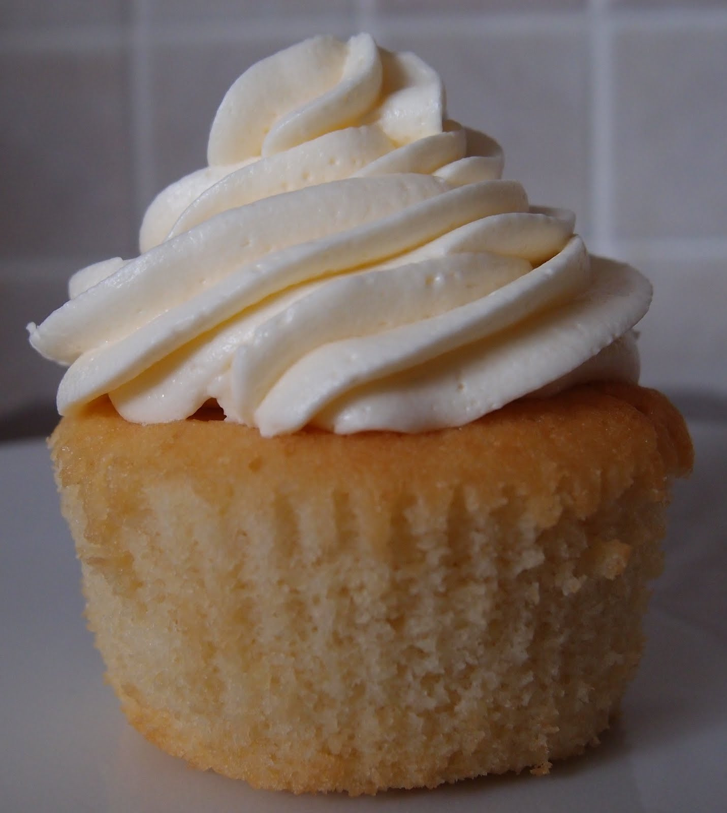 Rhubarb Custard Cupcakes
 The Caked Crusader Rhubarb and custard cupcakes