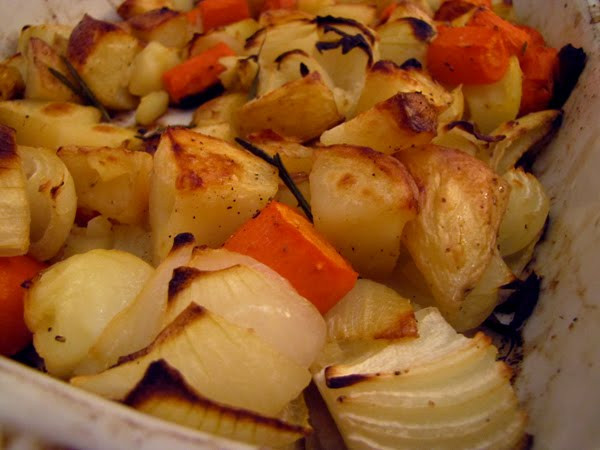 Roasted Potatoes And Carrots And Onions
 Roasted potatoes carrots & onions