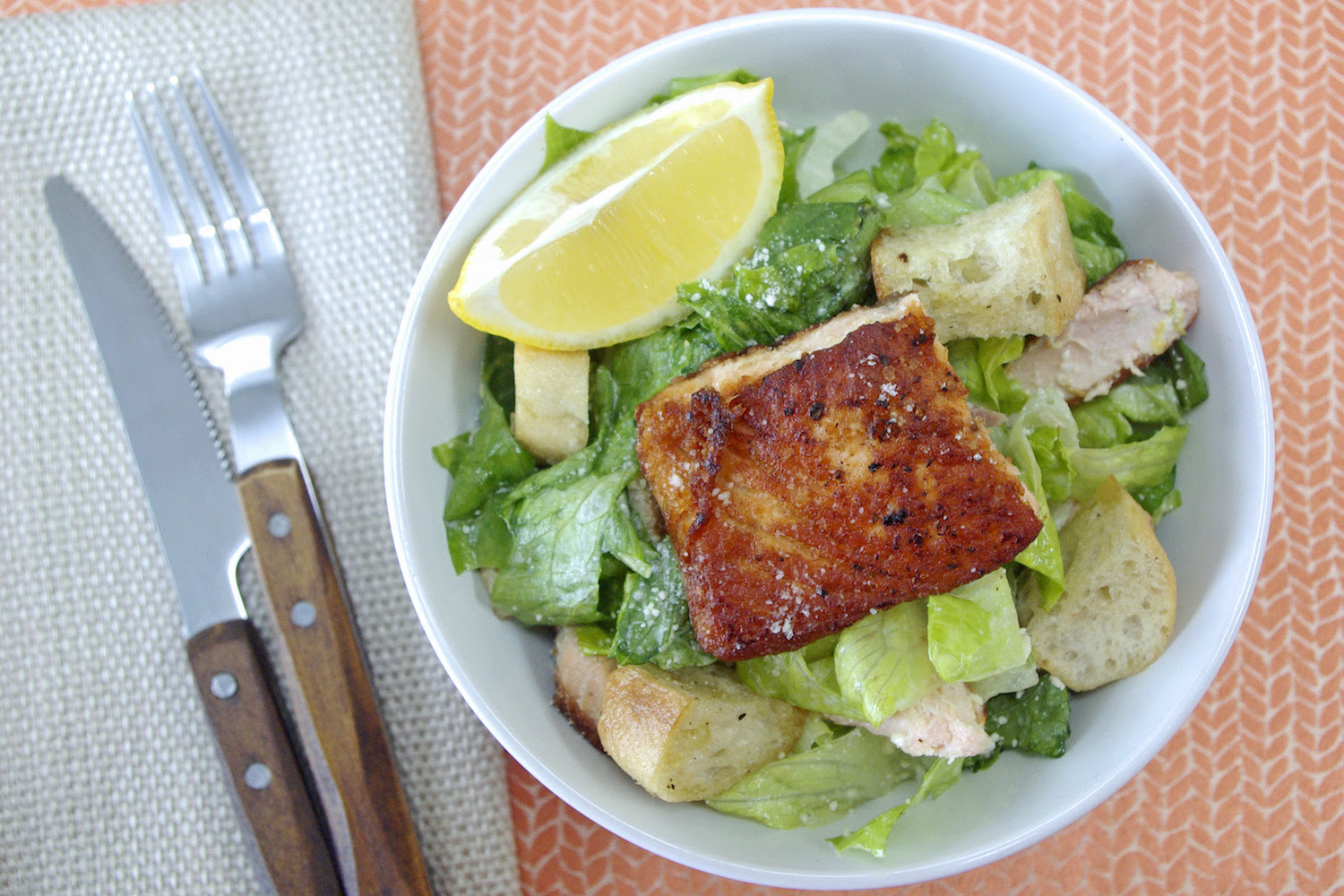 Salmon Caesar Salad
 Salmon Caesar Salad with homemade dressing and garlic