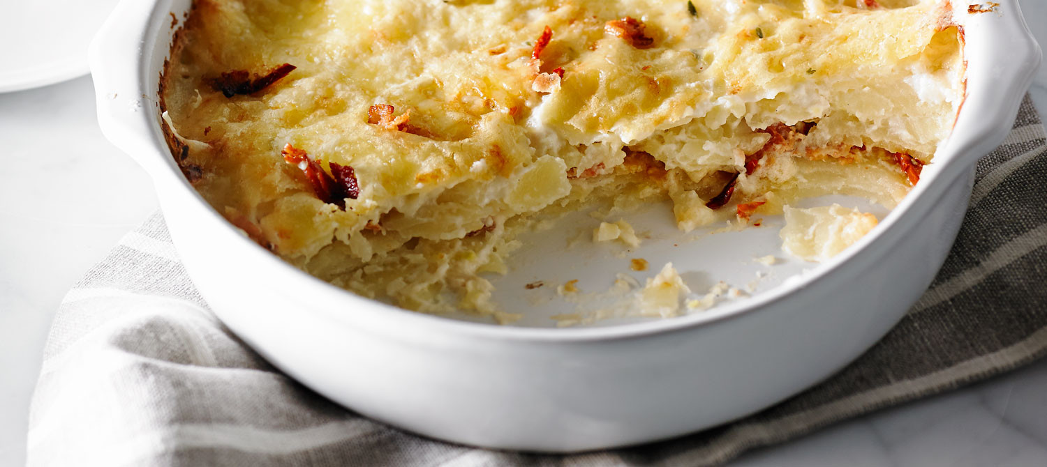 Scalloped Potatoes With Bacon
 Scalloped Potatoes with Bacon and Sun Dried Tomatoes