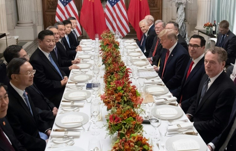 Trump Xi Dinner
 US and China in trade tariffs truce after tense G20 summit