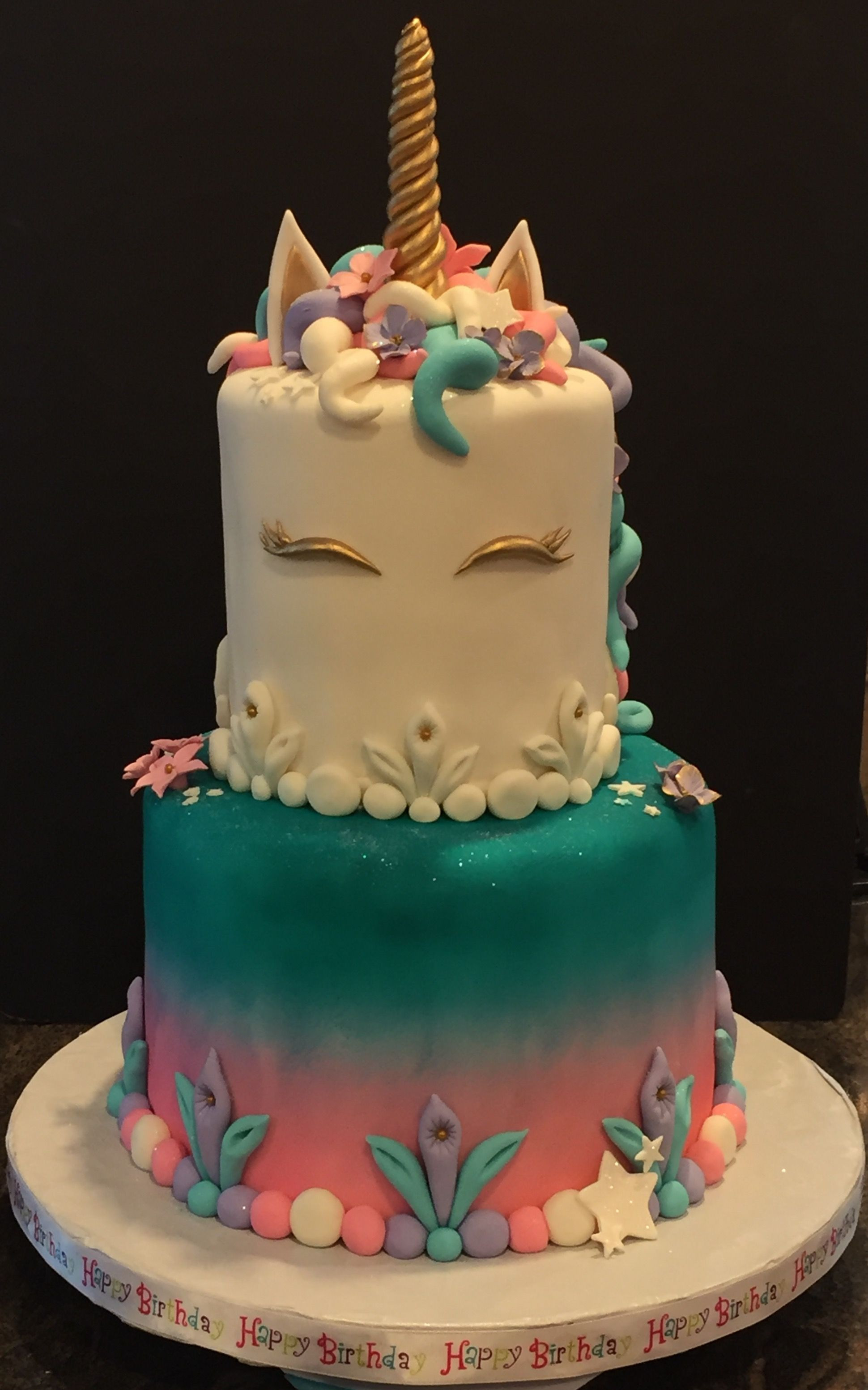 Unicorn Birthday Cake
 Unicorn cake I made All fondant with handmade gum paste