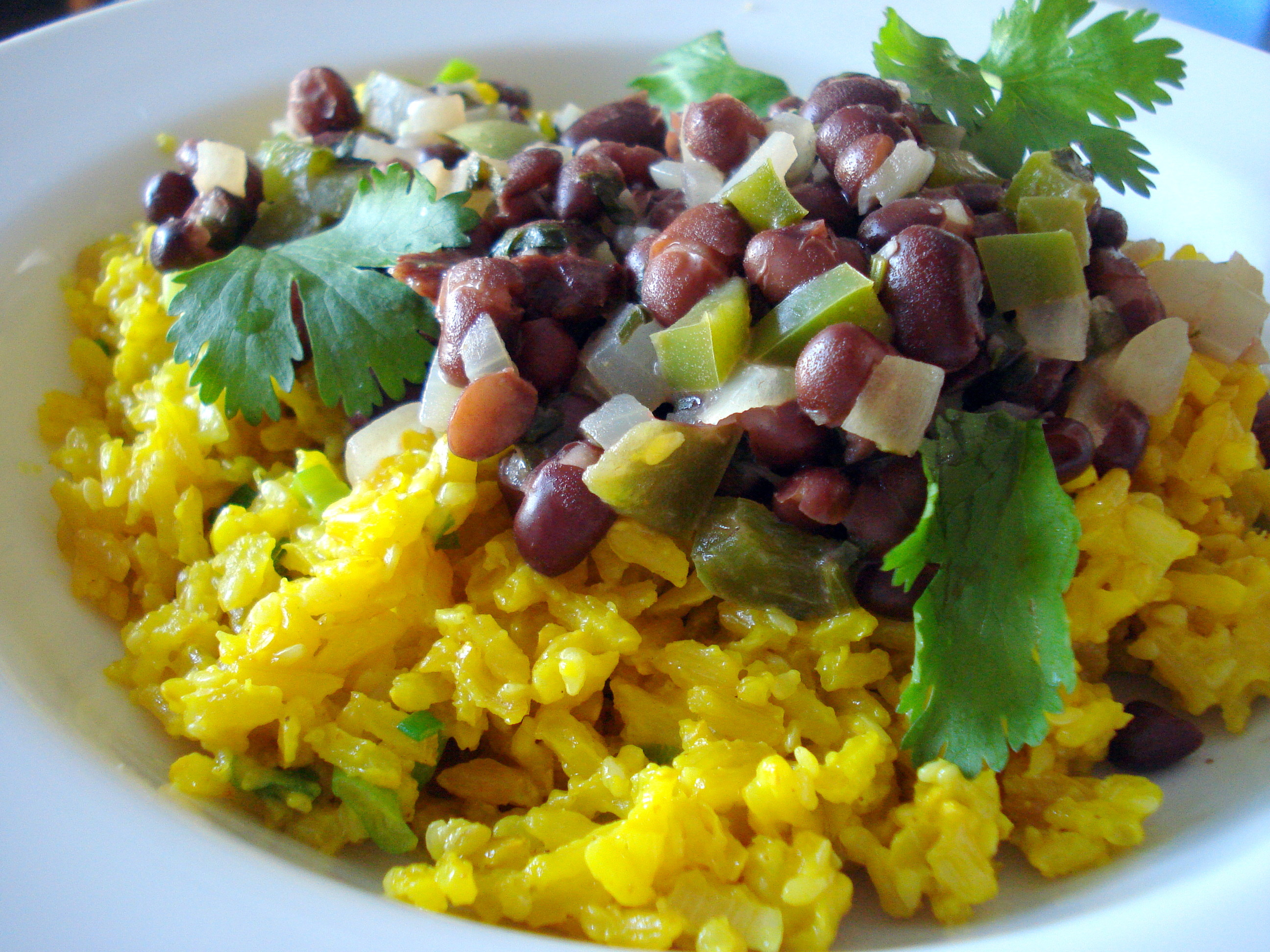 Yellow Rice And Beans
 Black beans with yellow coconut rice