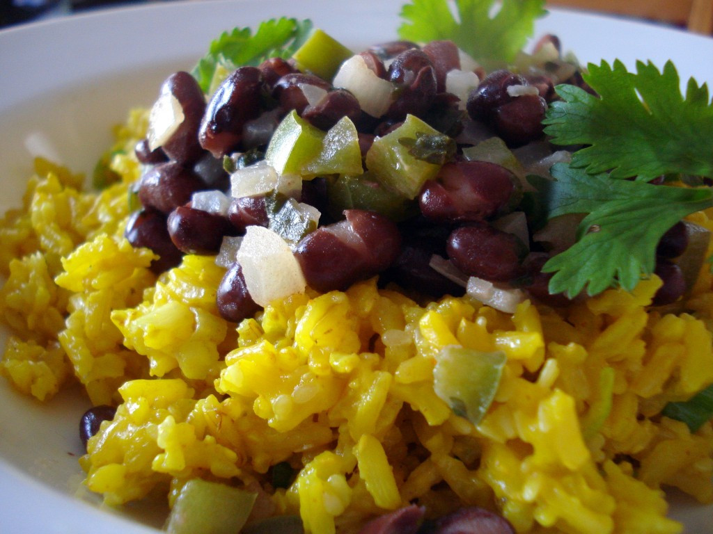 Yellow Rice And Beans
 Black beans with yellow coconut rice