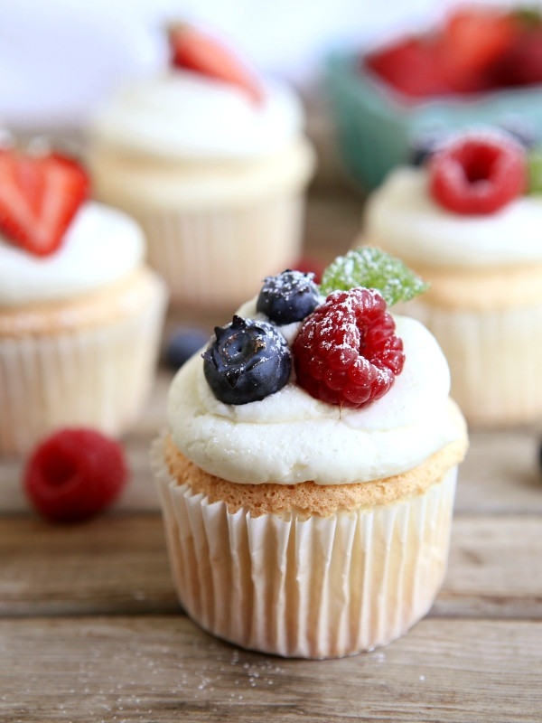 Angel Food Cake Cupcakes
 Angel Food Cupcakes with Whipped Buttercream and Berries