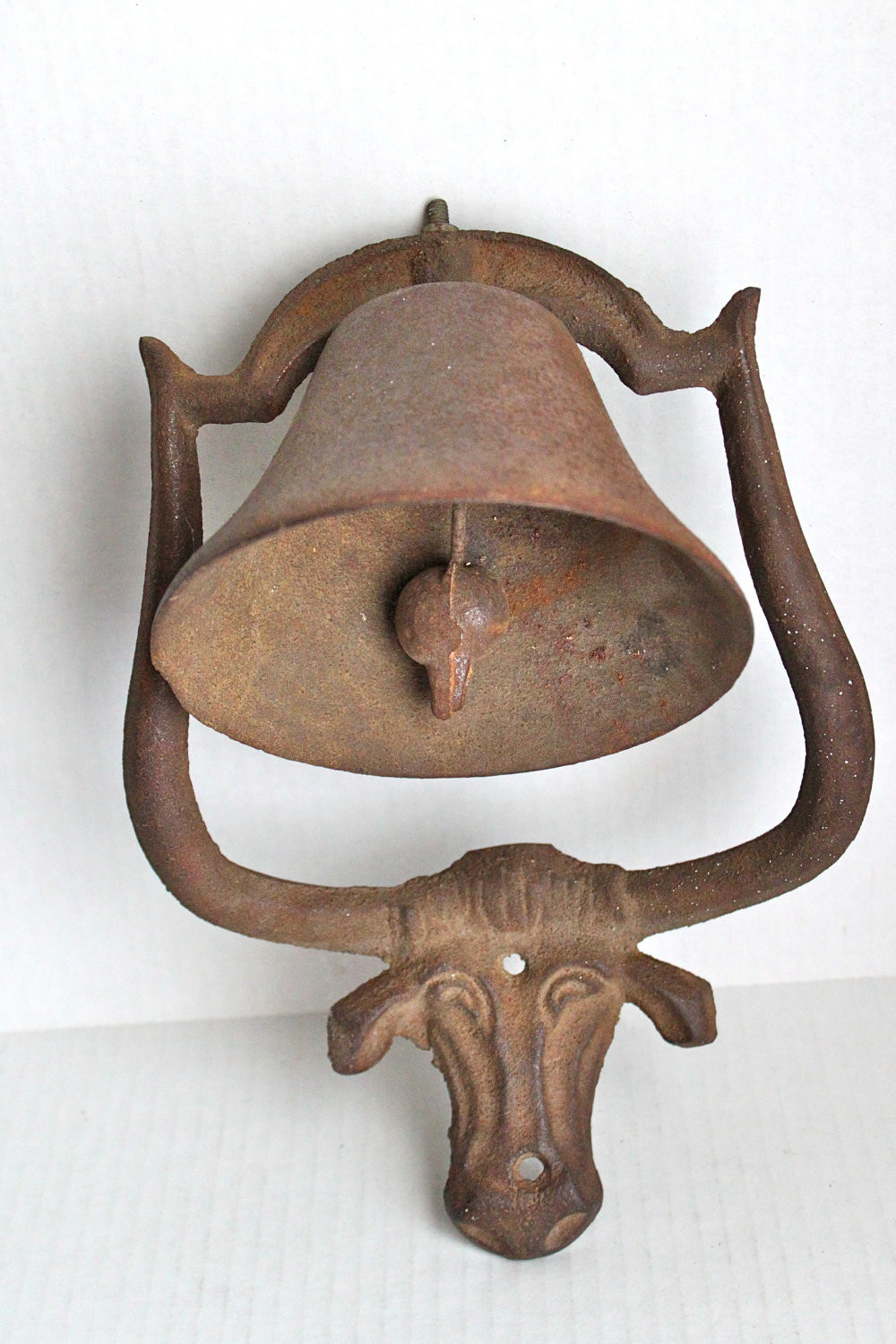 Antique Dinner Bell
 antique cast iron longhorn dinner bell rustic folk art