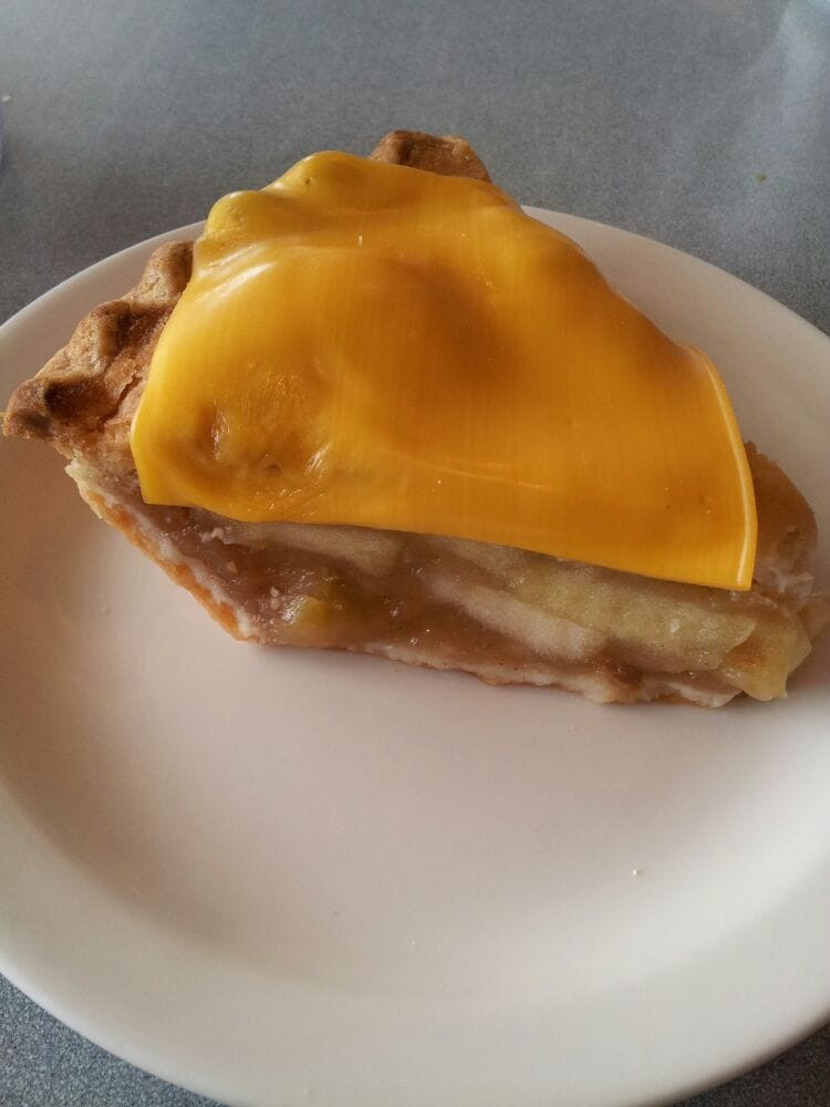 Apple Pie With Cheese
 Apple pie with a slice of American cheese Yelp