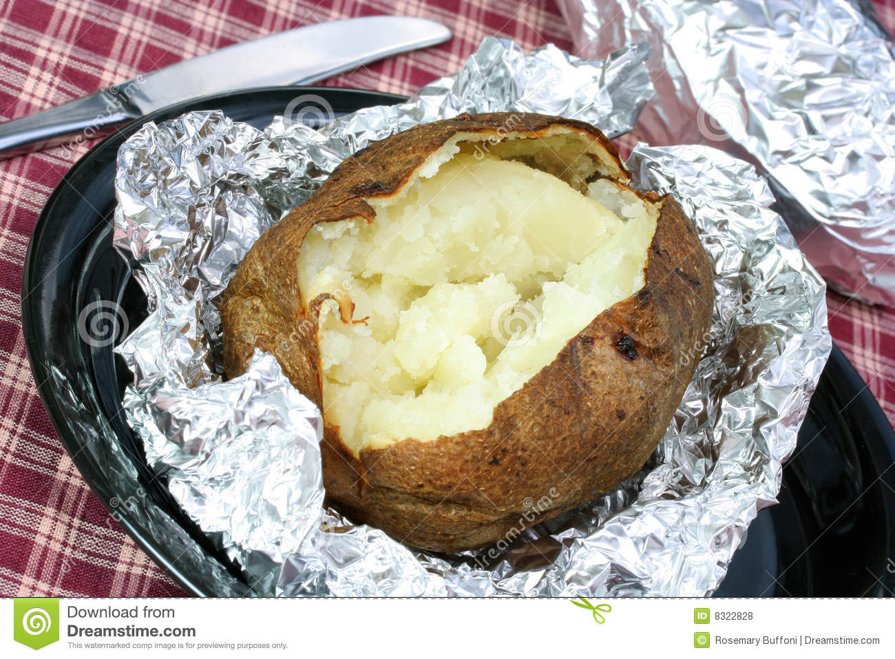 Baked Potato In Foil
 e Open Baked Potato Aluminum Foil Unwrapped Stock