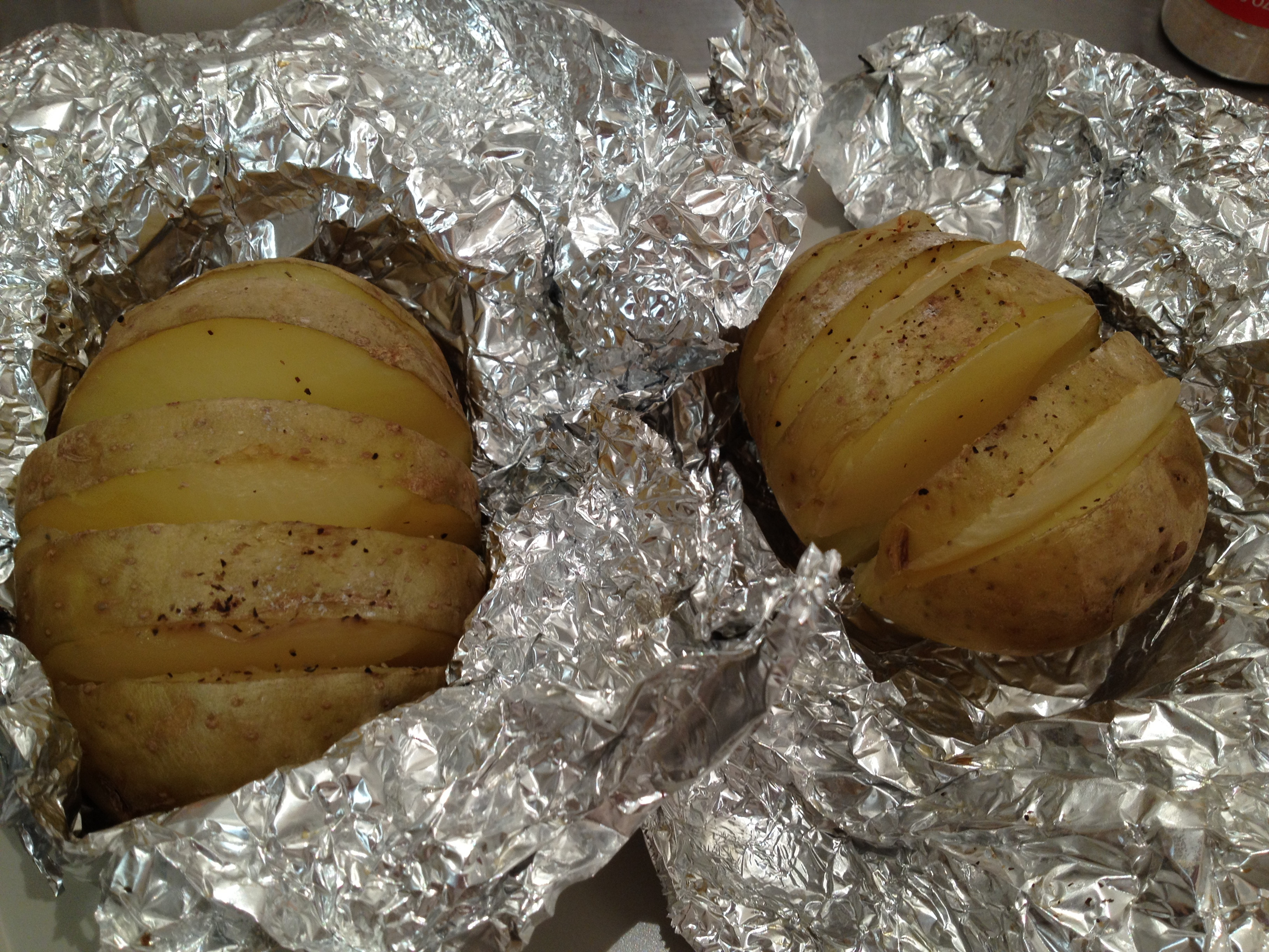 Baked Potato In Foil
 baked potato in oven wrapped in foil