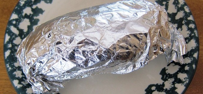 Baked Potato In Oven Wrapped In Foil
 Foil Wrapped Oven Baked Potato Recipe – Melanie Cooks