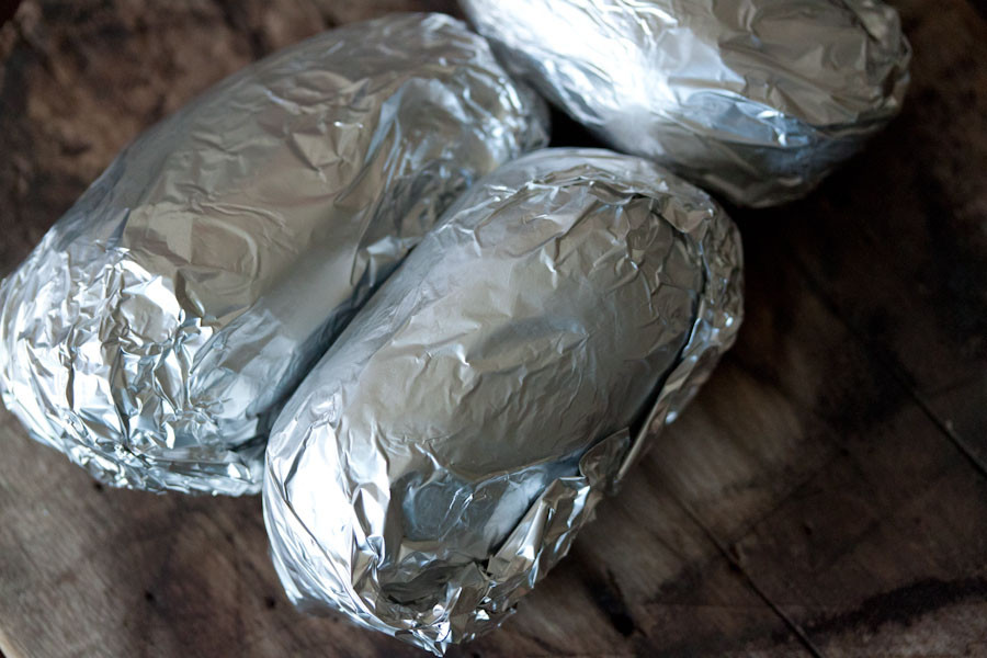 Baked Potato In Oven Wrapped In Foil
 baked potato in oven wrapped in foil