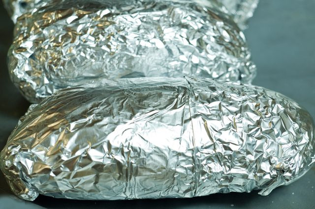 Baked Potato In Oven Wrapped In Foil
 How to Bake Foil Wrapped Potatoes