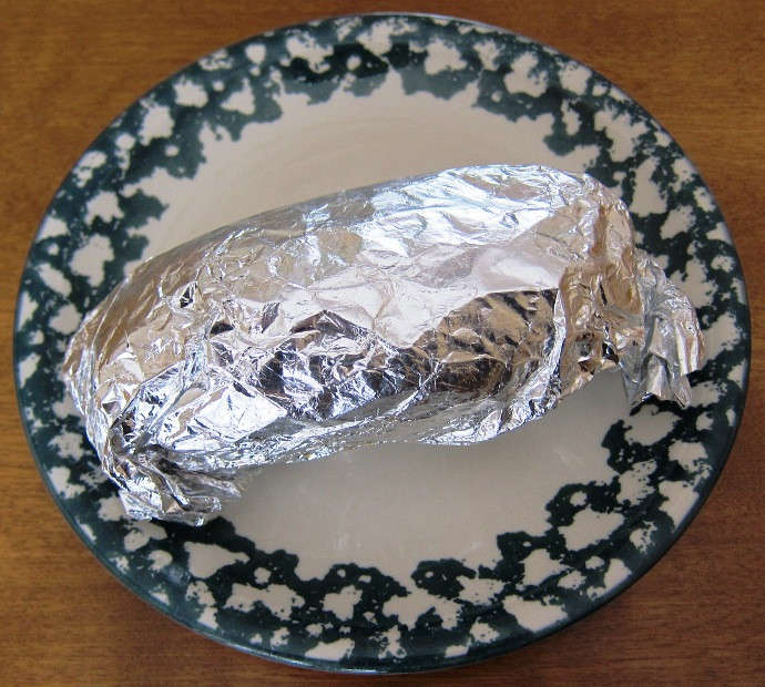 Baked Potato In Oven Wrapped In Foil
 Foil Wrapped Oven Baked Potato Recipe – Melanie Cooks