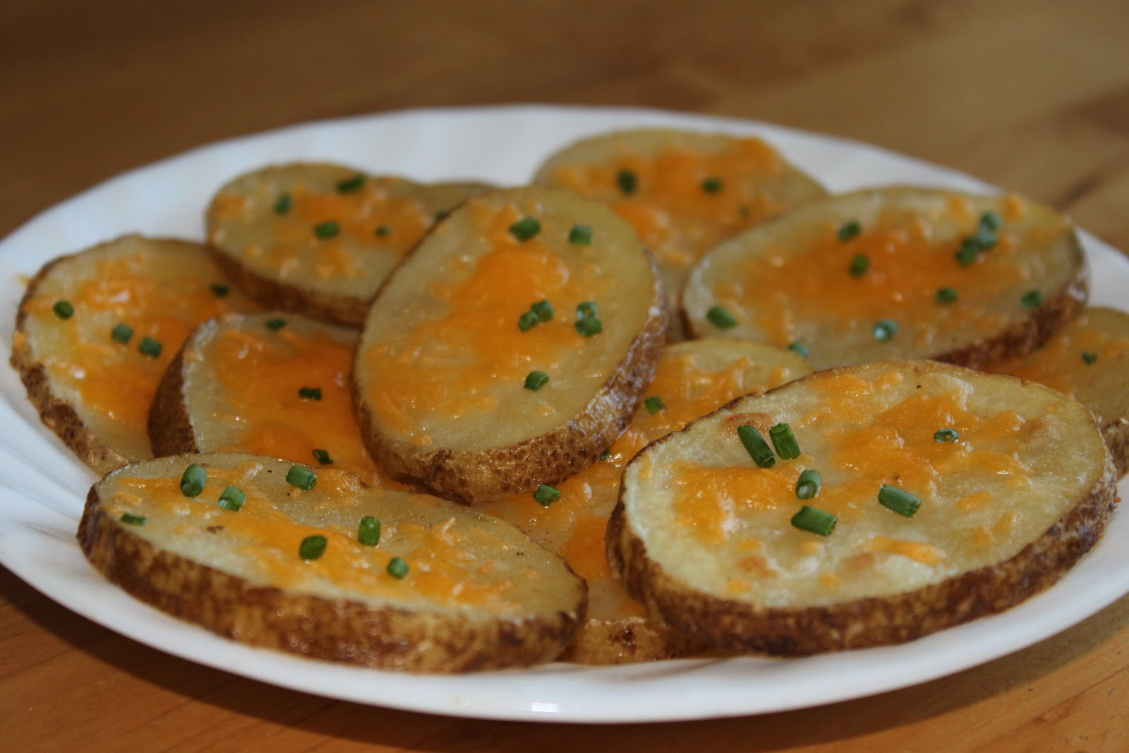 Baked Potato Slices
 Recipes Plus More Cheesy Baked Potato Slices