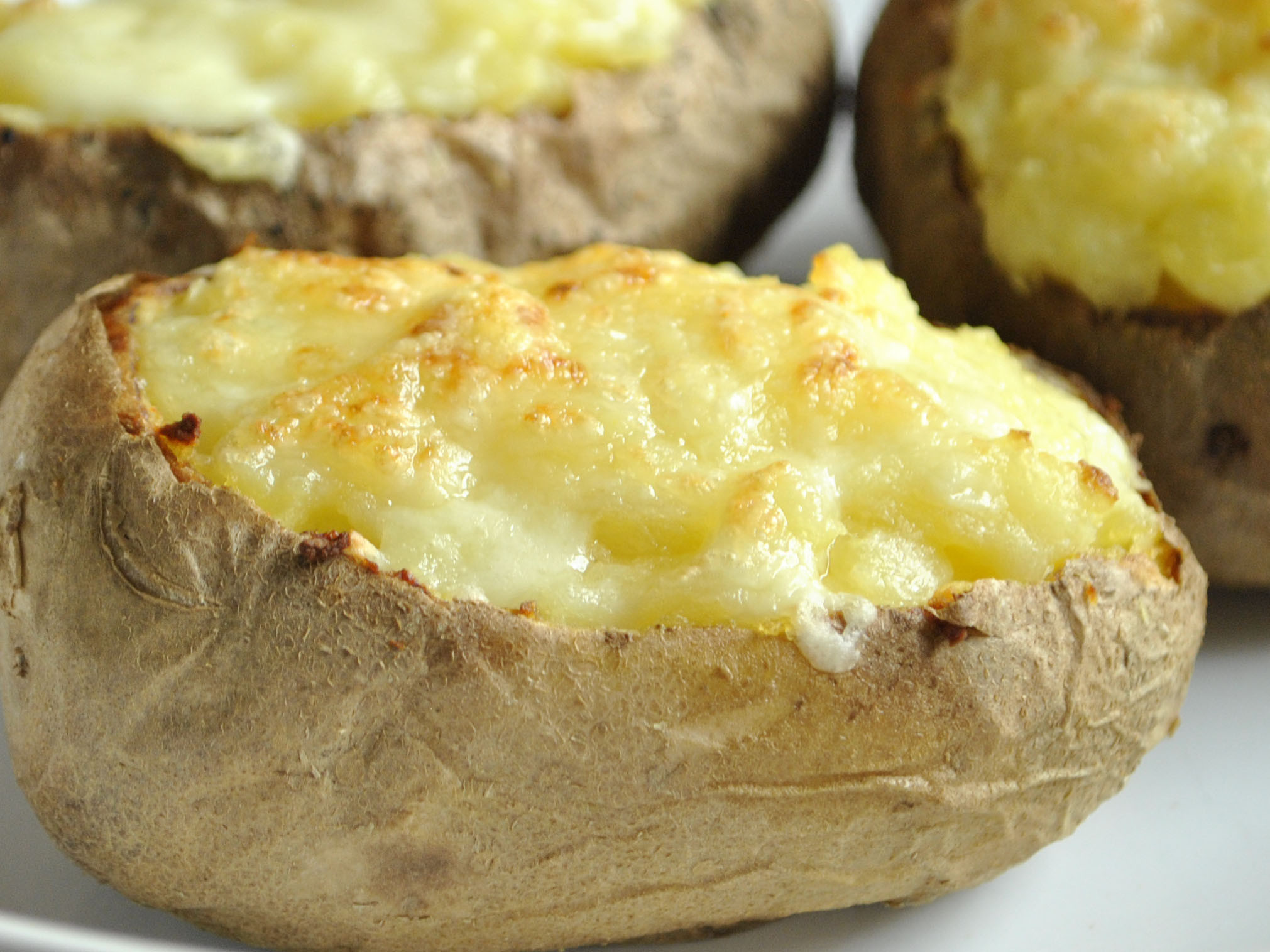 Baked Potato With Cheese
 How to Make Garlic and Cheese Twice Baked Potatoes 6 Steps
