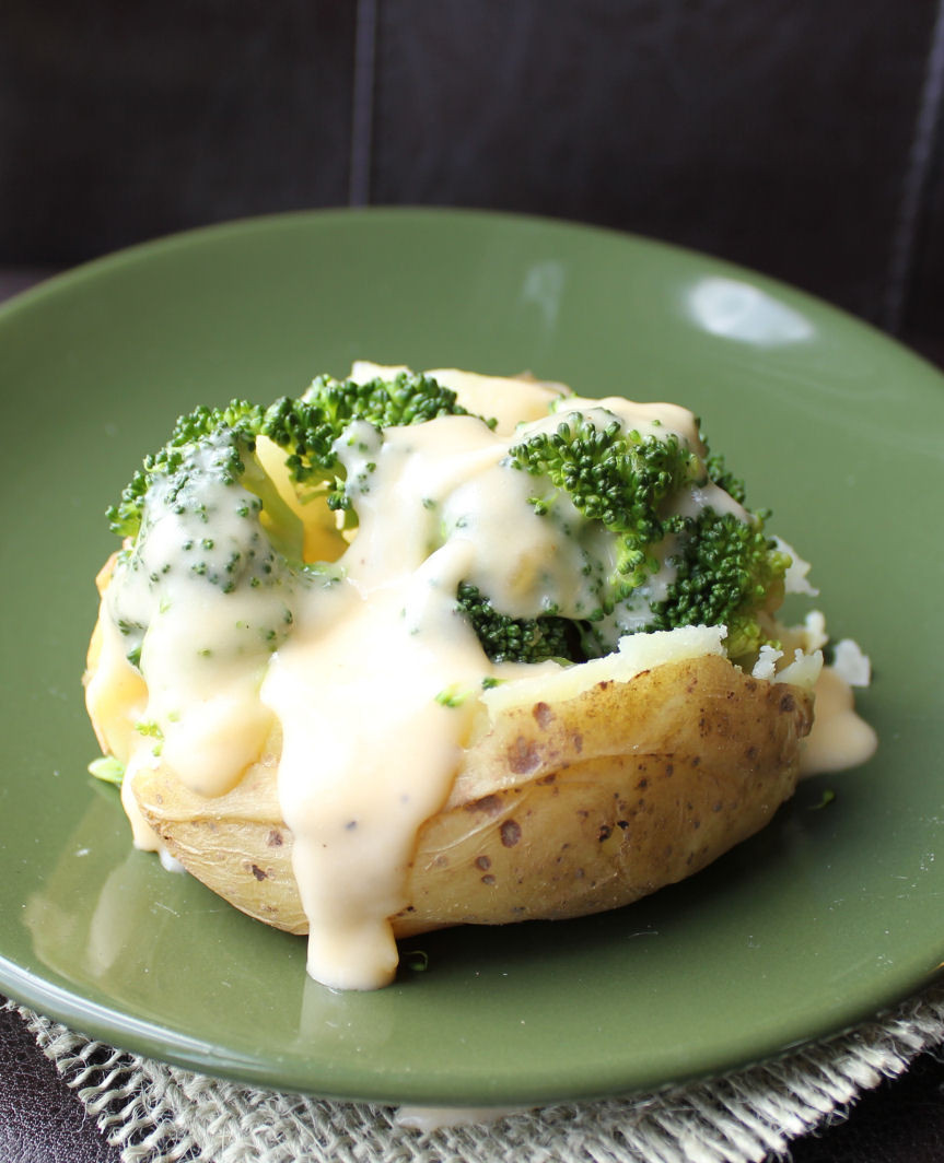 Baked Potato With Cheese
 Baked Potatoes Crock Pot with Broccoli Cheddar Cheese Sauce