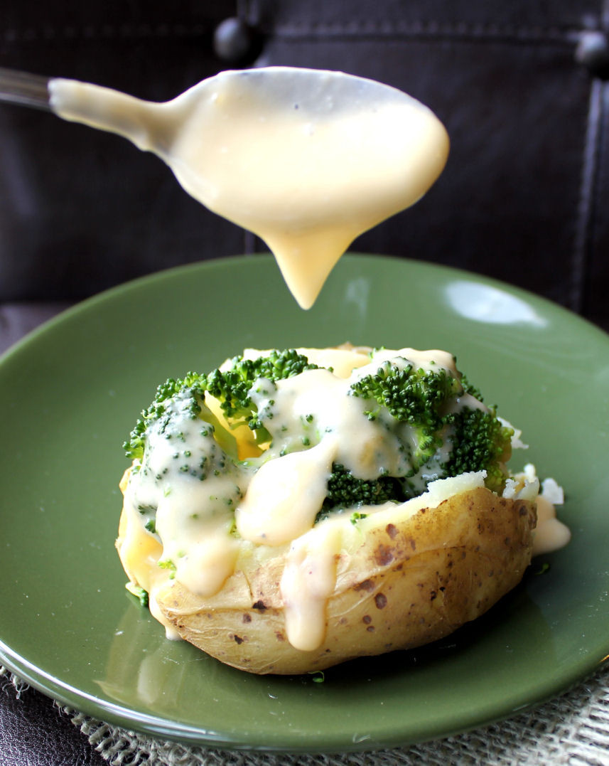 Baked Potato With Cheese
 Baked Potatoes Crock Pot with Broccoli Cheddar Cheese Sauce