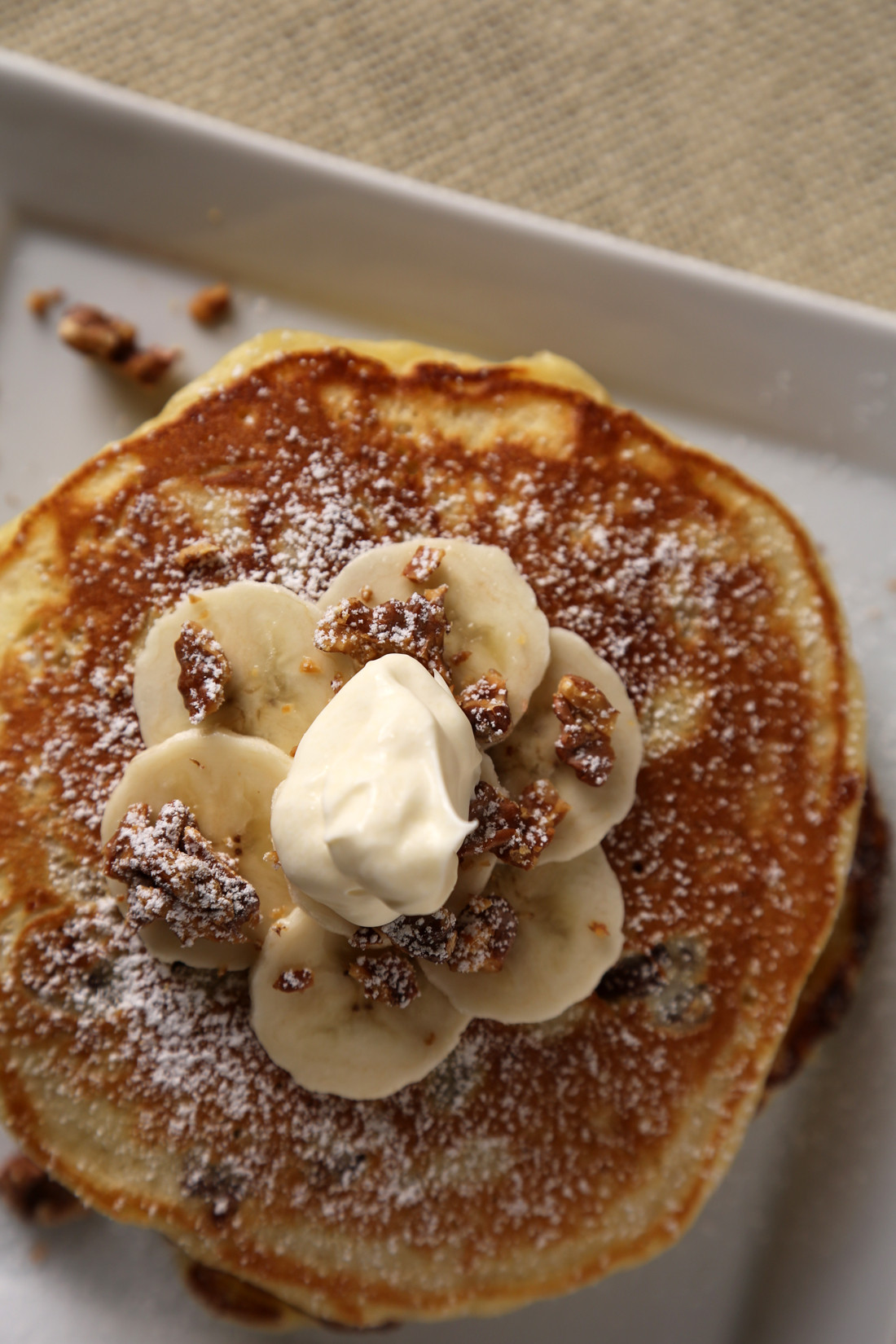 Banana Nut Pancakes
 A sprinkle of powdered sugar and a dollop of crème fraiche