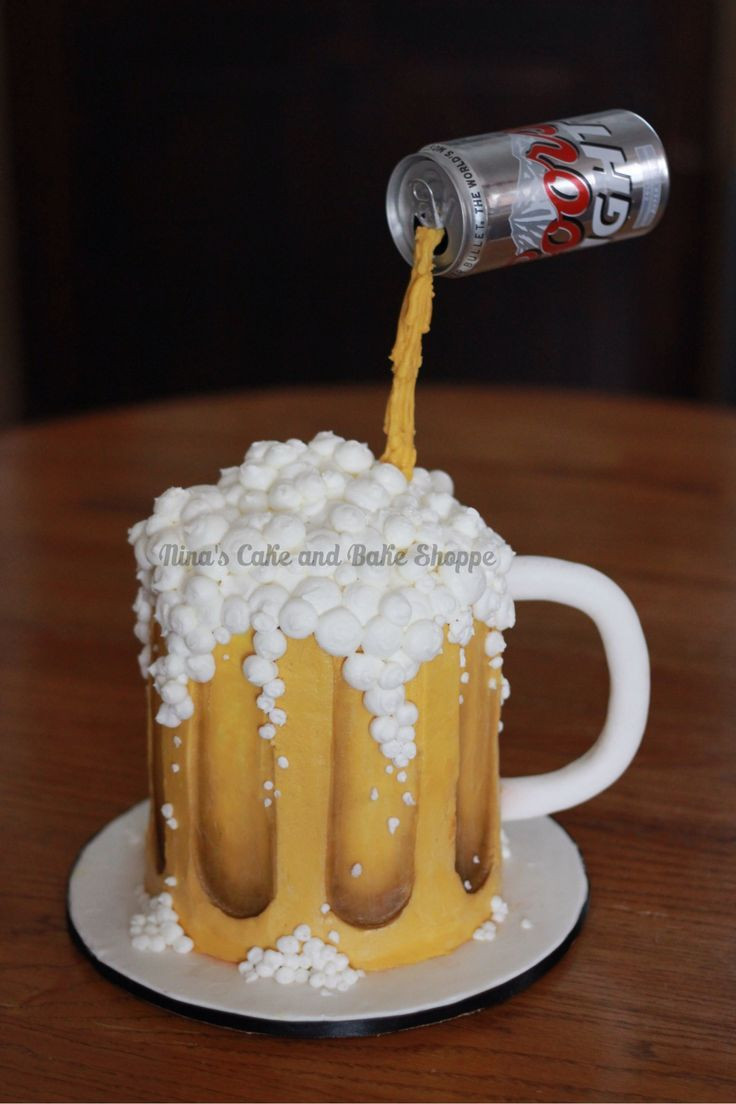 Beer Mug Cake
 Coors Light Beer mug gravity cake Birthday cake