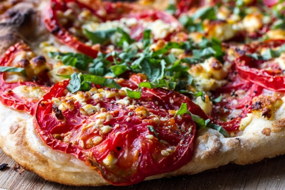 Big Tomato Pizza
 White Pizza With Fresh Tomatoes Feta and Basil