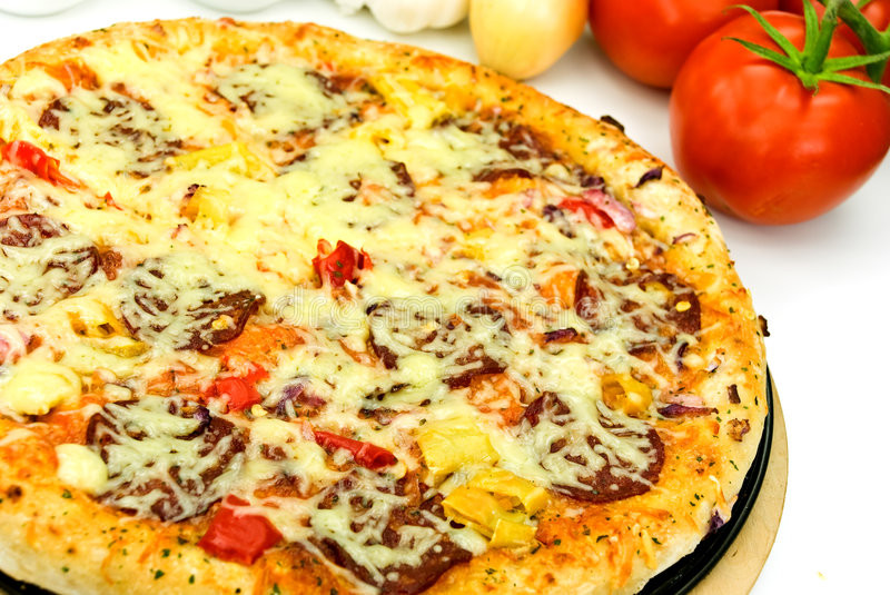 Big Tomato Pizza
 A Big Pizza With Cheese salami tomatoes Stock