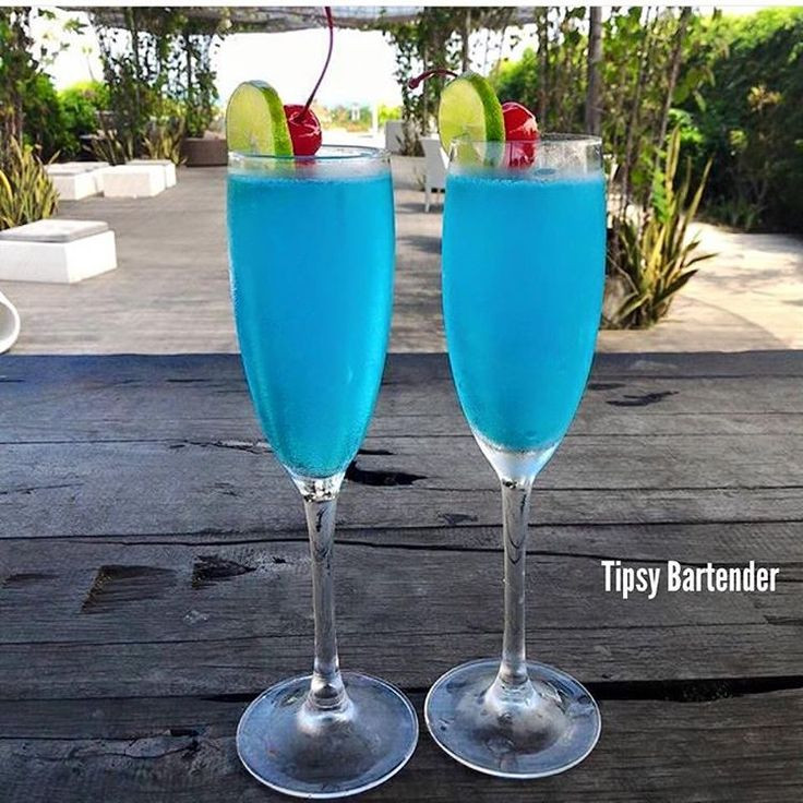 Blue Vodka Drinks
 SPARKLING BLUES Vodka Lime Juice Blue Curacao Top with