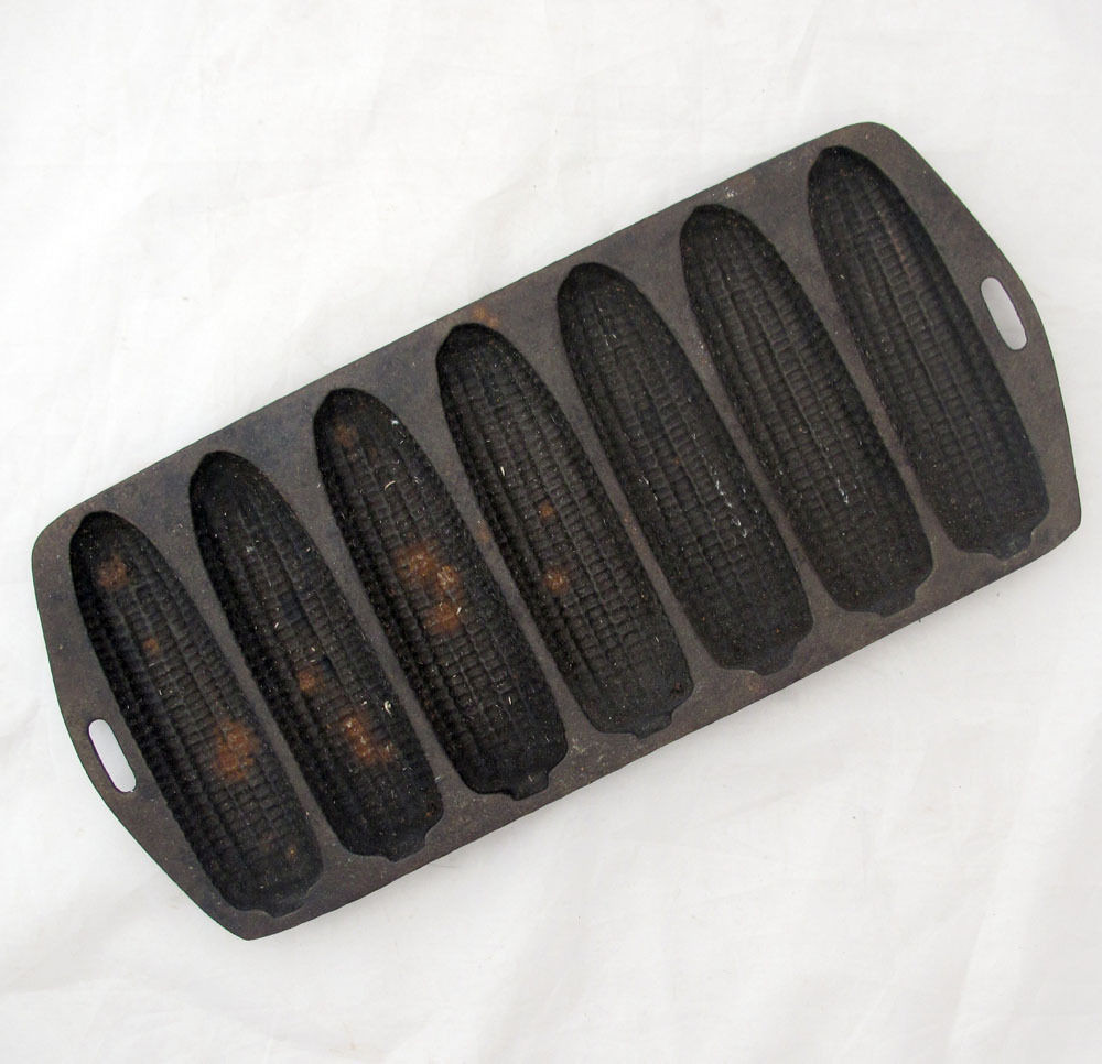 Cast Iron Cornbread Pan
 CAST IRON CORNBREAD PAN SEVEN CORN COB FORMS VINTAGE
