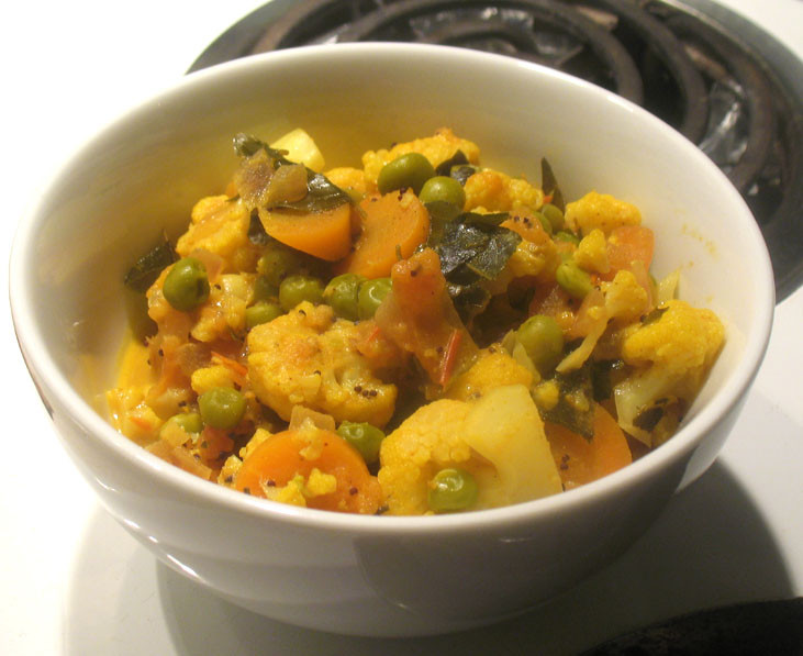 Cauliflower Curry Indian
 Cauliflower Carrot and Green Pea Curry with Coconut Milk