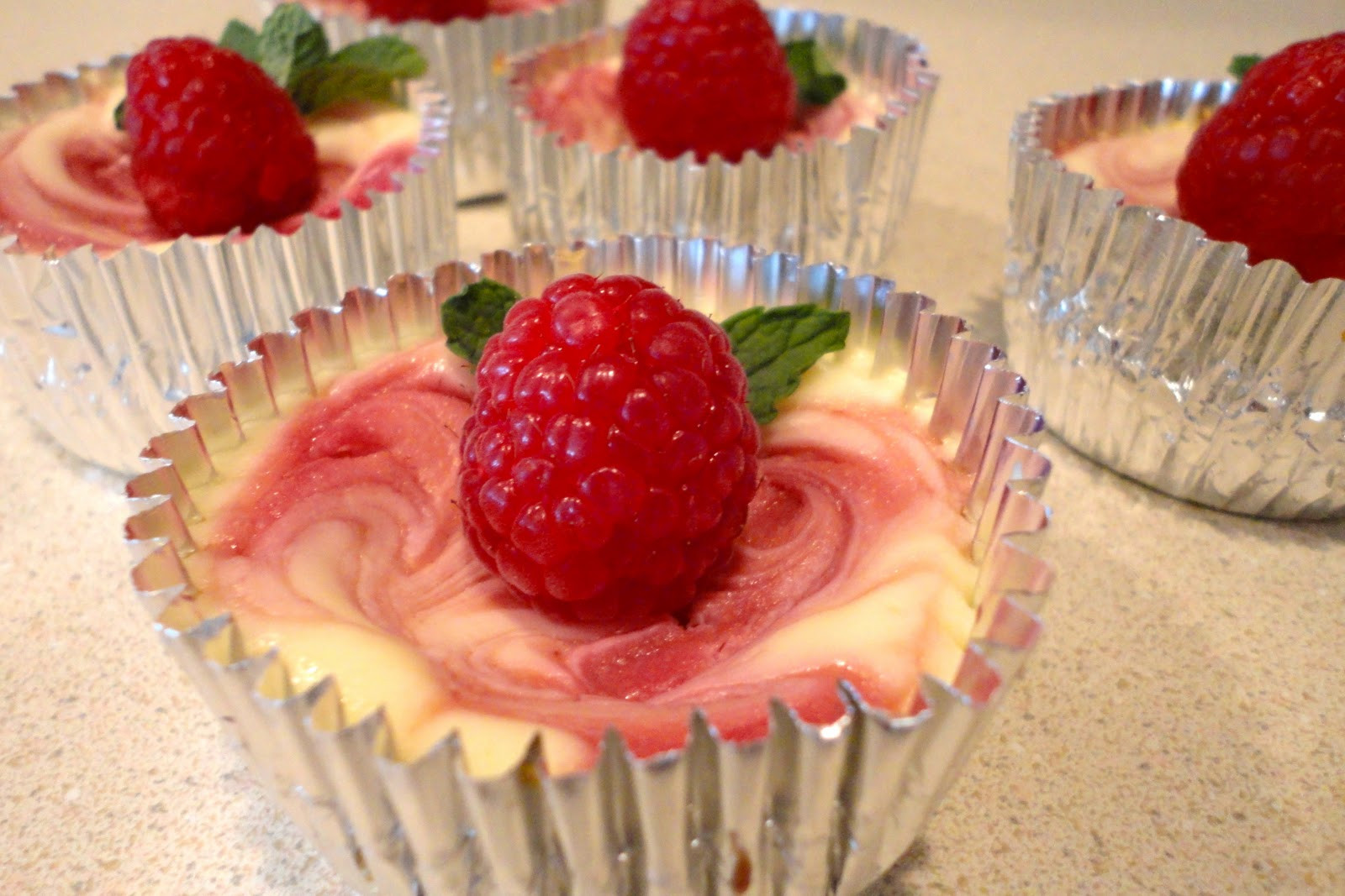 Cheesecake Cupcake Recipe
 Raspberry Swirl Cheesecake Bites recipe Love Stitched