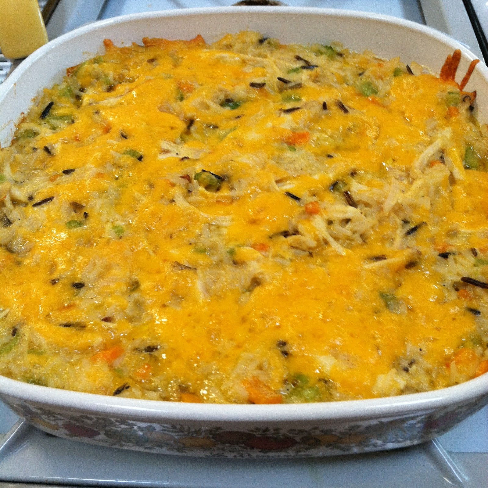 Cheesy Chicken Casserole
 Quest for Delish Cheesy Chicken Wild Rice Casserole