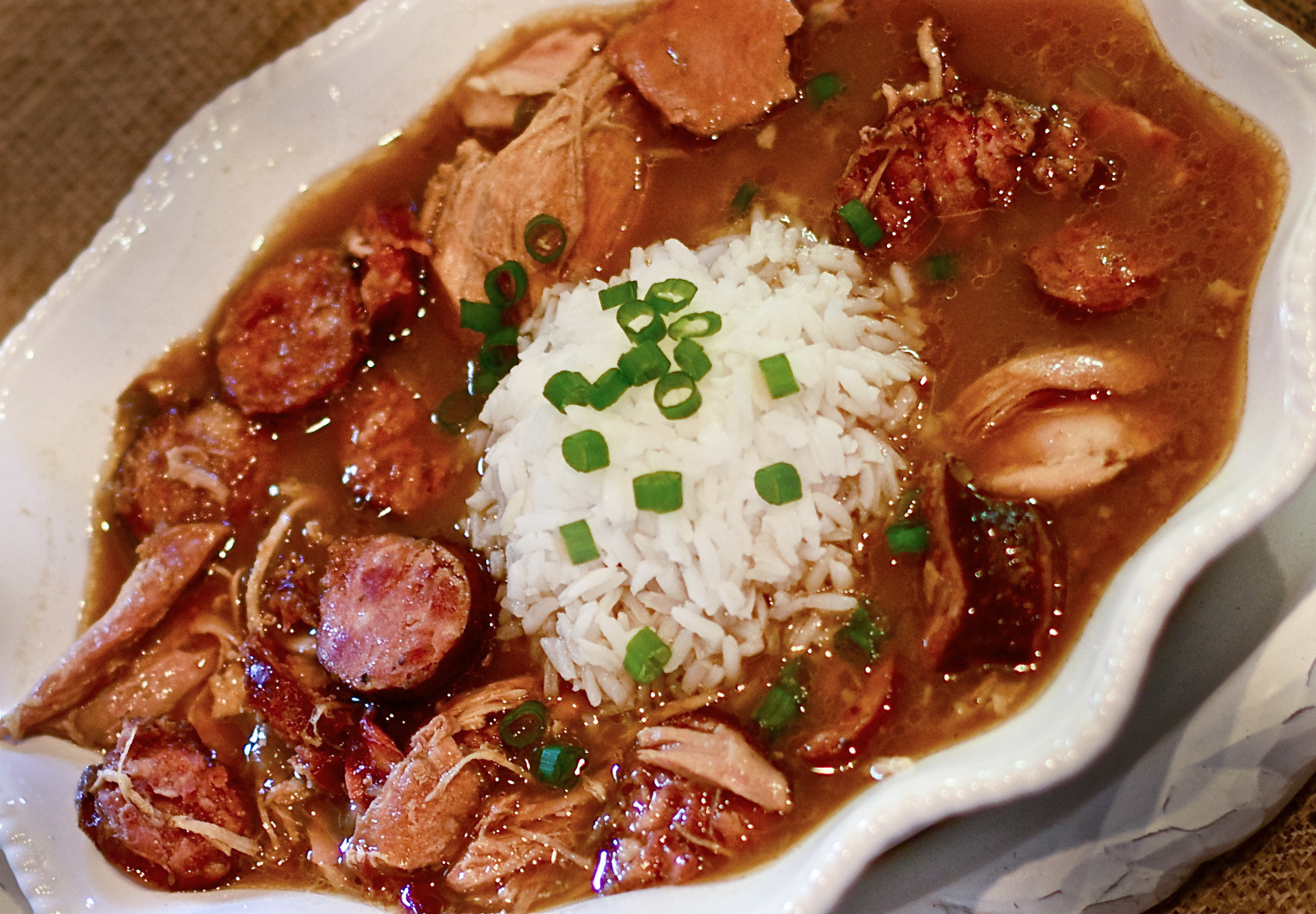 Chicken And Sausage Gumbo
 Chicken and Smoked Sausage Gumbo is a deep dark Cajun dish