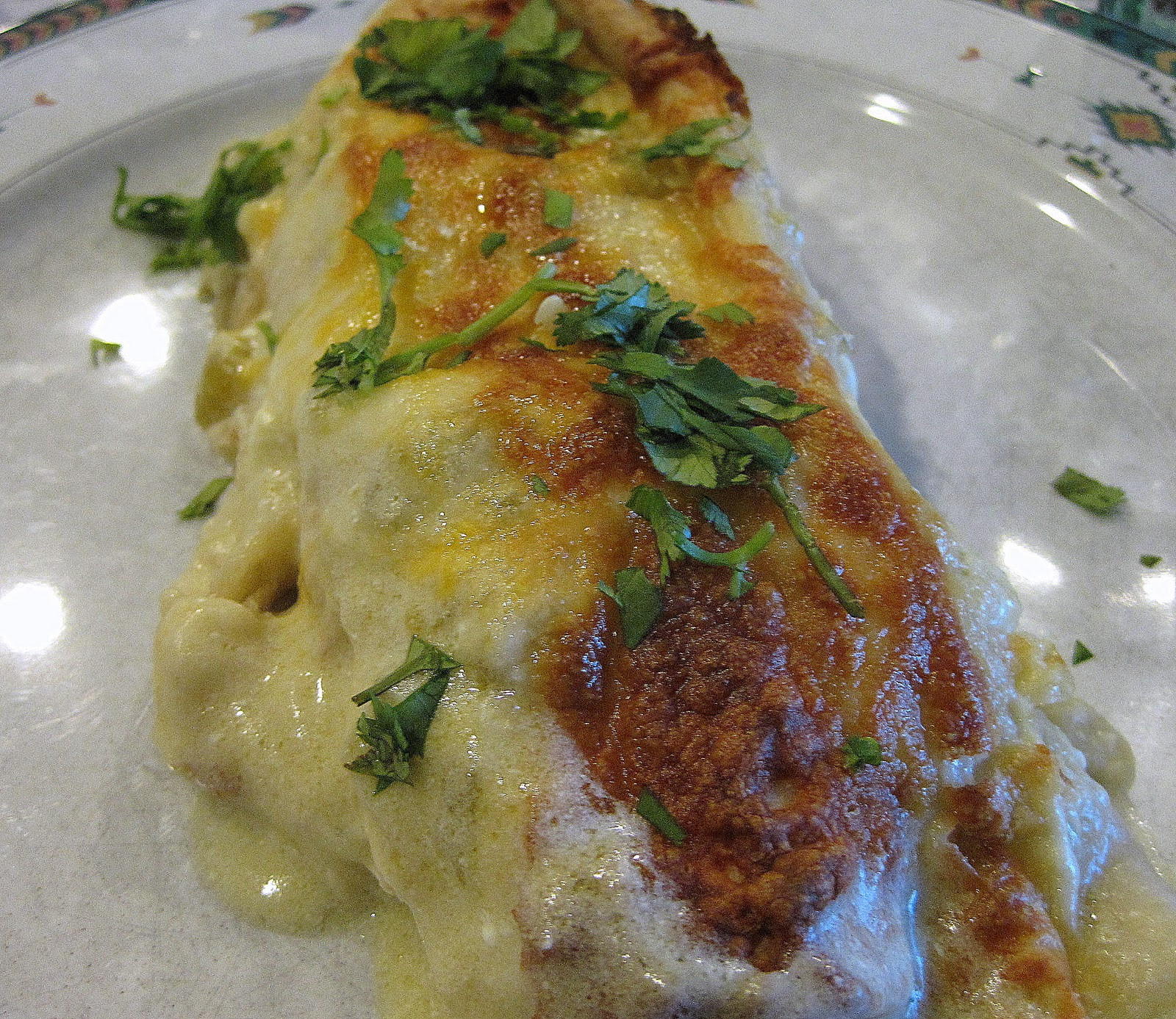 Chicken Enchiladas With Green Sauce
 Chicken Enchiladas with Green Chile Sour Cream Sauce