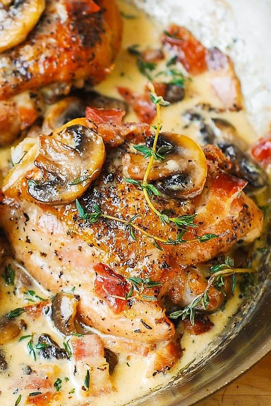 Chicken Thighs With Mushrooms
 Chicken Thighs with Creamy Bacon Mushroom Thyme Sauce