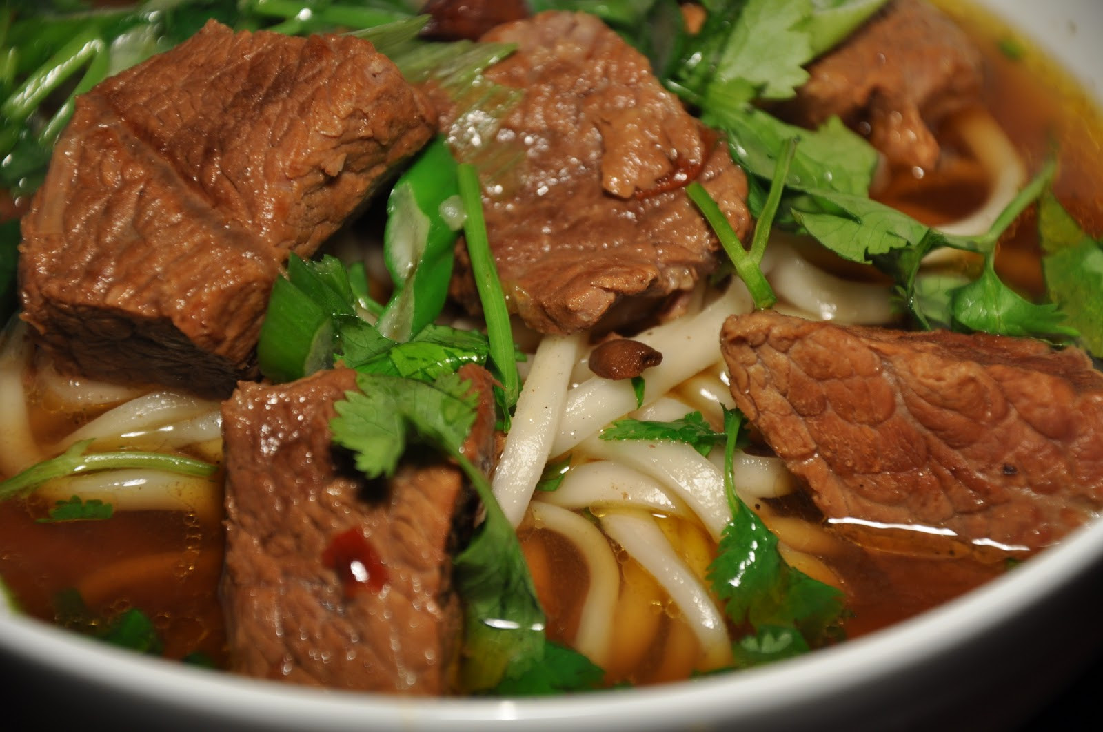 Chinese Beef Noodles Soup
 Slice of Rice Chinese New Year Meal 5 Red Braised Beef