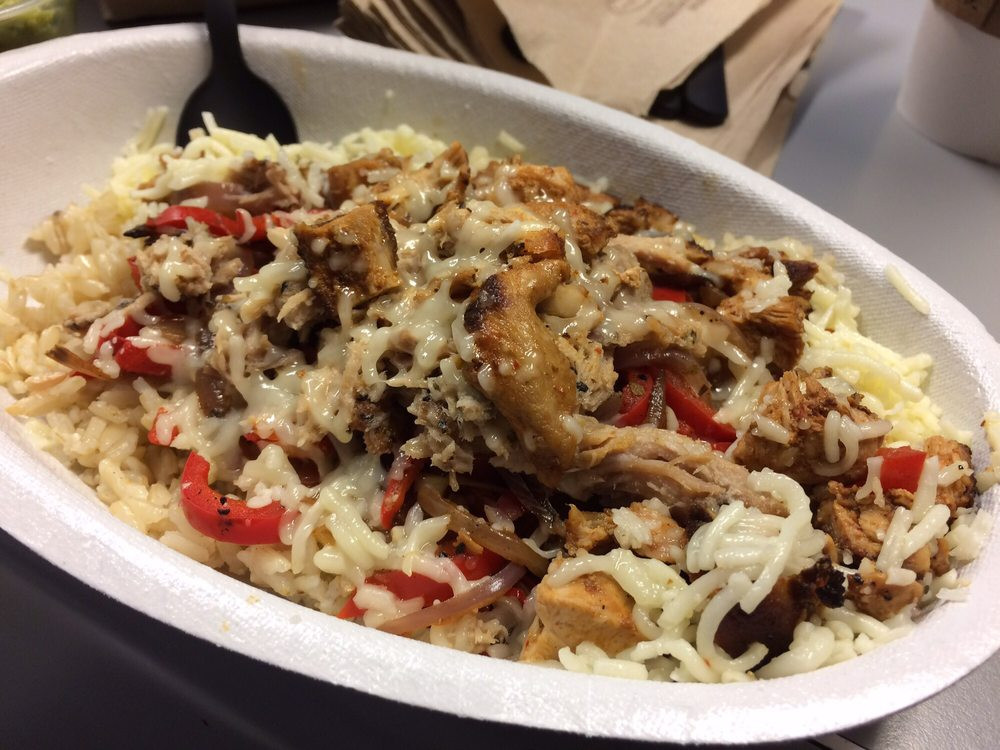 Chipotle Mexican Grill Brown Rice
 I finally gave in Chicken and carnitas bowl with brown