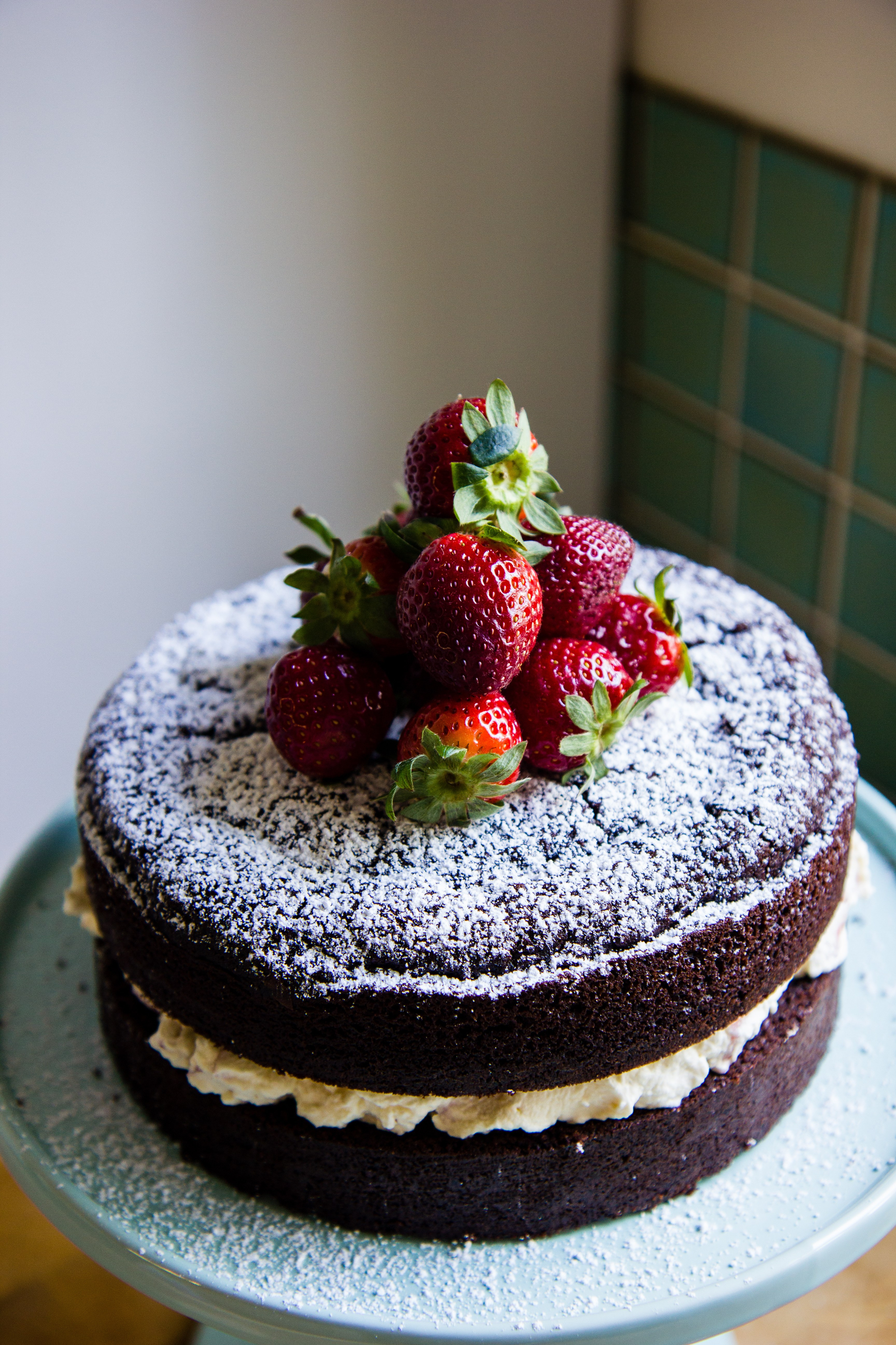 Chocolate Cake With Strawberries
 Chocolate celebration cake with strawberries and cream